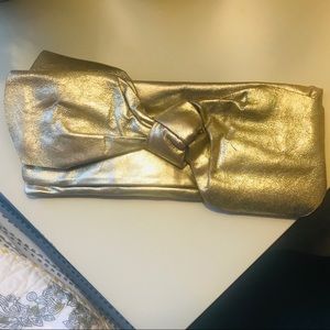 LK Bennett distressed leather gold clutch with bow